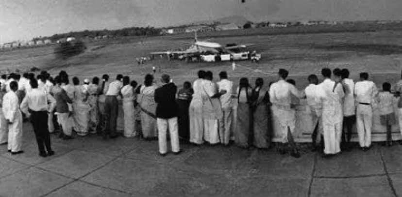 Old picture of people viewing planes at Bombay airport