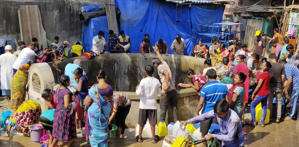 People Scampering to old village well